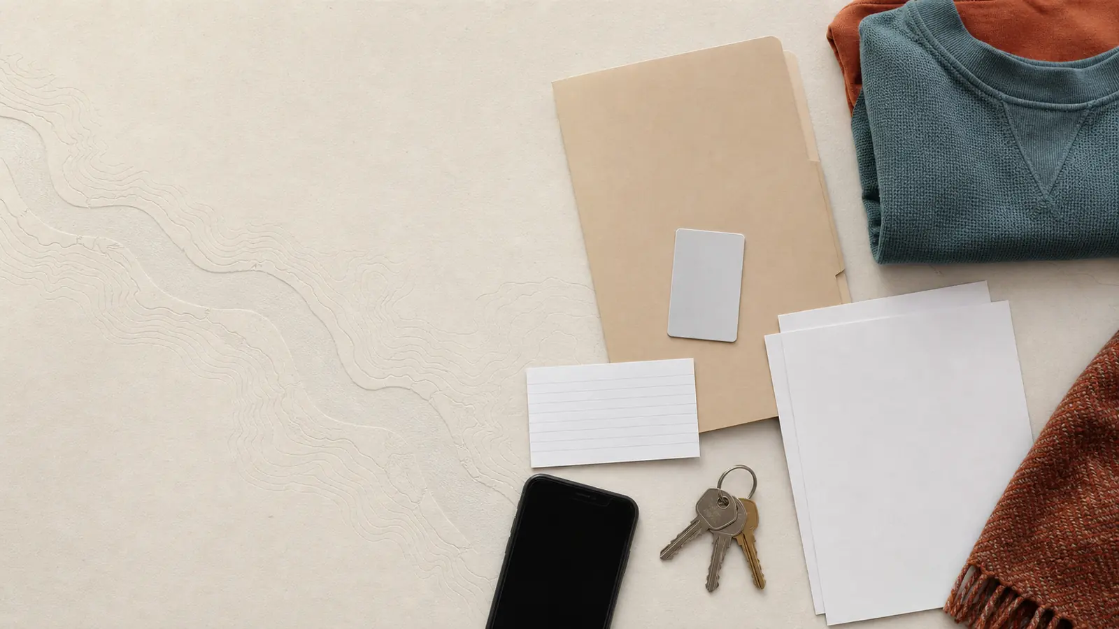 Organized flat lay of photo ID, discharge folder, medication list, notes, and phone with no private details visible
